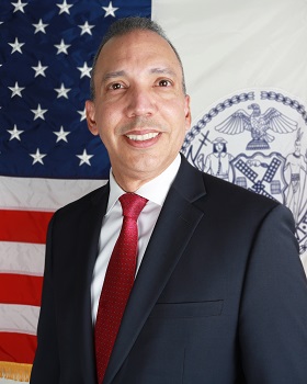 Commissioner Louis A. Molina